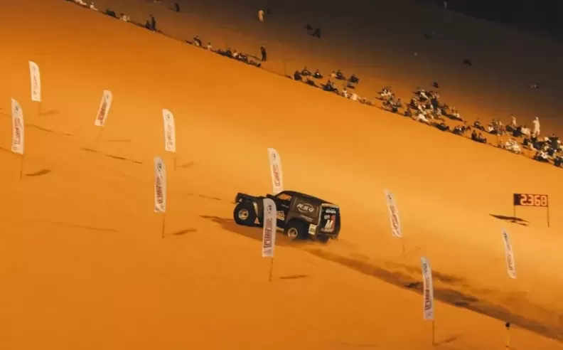 Conquering the tallest sand dune in the world, “Moreeb Dune ”