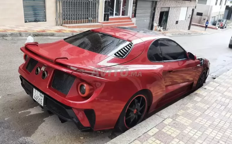 Bugatti in the Front, Ford in the Back