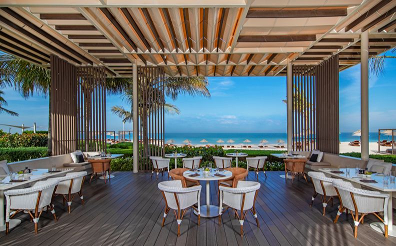 Al Zorah wellness experiences with nourishing dining and sunset yoga