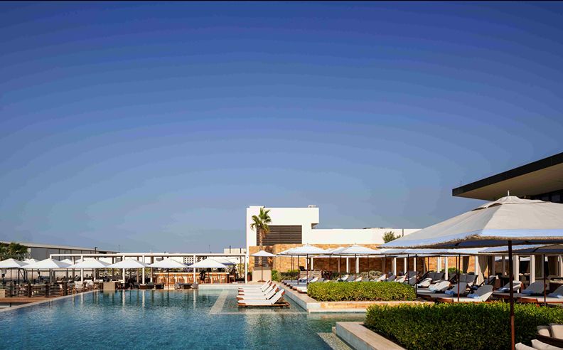 Ilios Offers a Relaxed Summer Escape by the Water