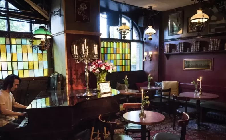 Step into the Glamour of Café Intime