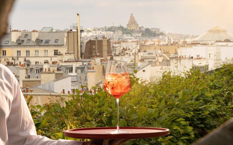 Play and Postcards in the Parisian Sky