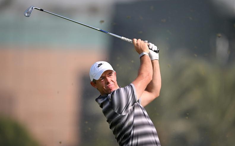 Wallace Surges as McIlroy Shares Lead